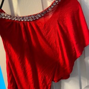 Over the shoulder  one sleeve red jeweled neck shirt